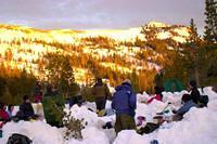 Snowcampers watching the sunset